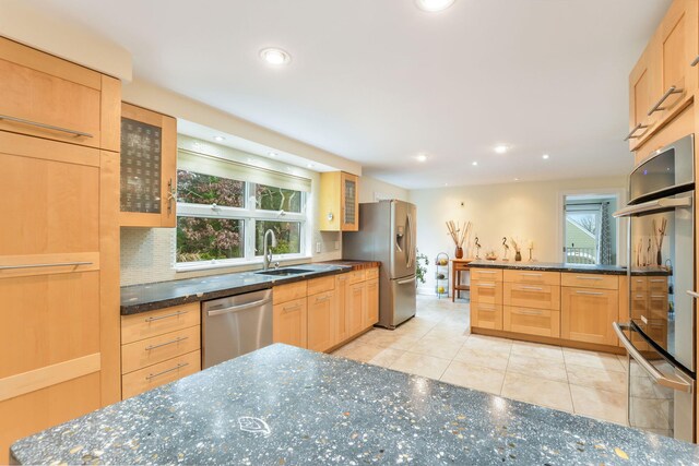 10 Westerly Dr, Bourne, MA 02532 - kitchen with glass insert cabinets, recessed lighting, stainless steel appliances, and a sink