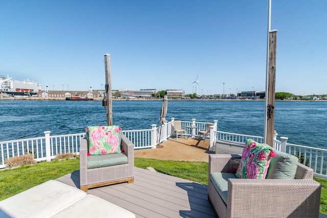 wooden terrace with a water view