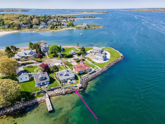 aerial perspective of suburban area featuring a nearby body of water