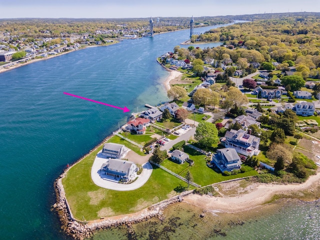 aerial view of residential area with a nearby body of water