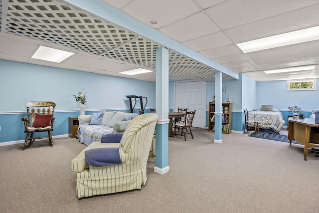 54 Mcnamara Ave, West Yarmouth, MA 02673 - carpeted living area featuring a drop ceiling and baseboards