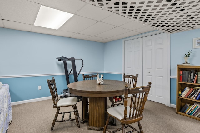 54 Mcnamara Ave, West Yarmouth, MA 02673 - carpeted dining room with a paneled ceiling and baseboards