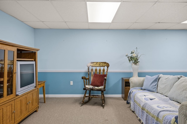 54 Mcnamara Ave, West Yarmouth, MA 02673 - sitting room featuring light colored carpet, a drop ceiling, and baseboards