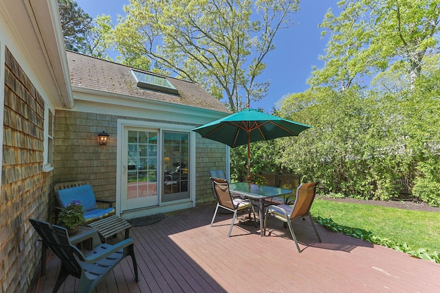 54 Mcnamara Ave, West Yarmouth, MA 02673 - wooden terrace featuring outdoor dining space