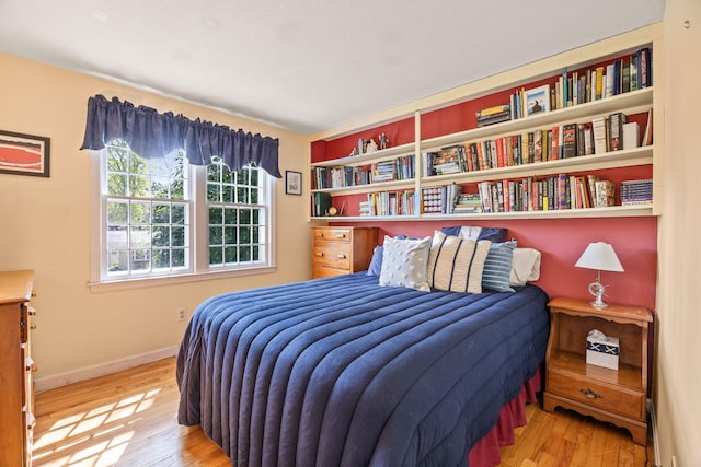 54 Mcnamara Ave, West Yarmouth, MA 02673 - bedroom with wood finished floors and baseboards