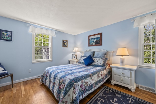 54 Mcnamara Ave, West Yarmouth, MA 02673 - bedroom featuring wood finished floors and baseboards