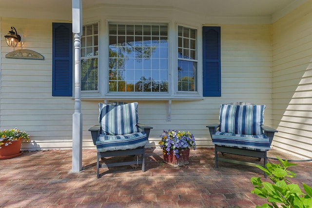 54 Mcnamara Ave, West Yarmouth, MA 02673 - view of covered porch