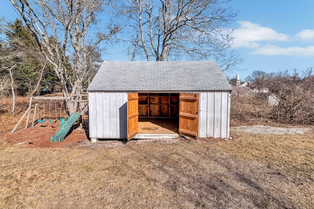 view of shed featuring a playground