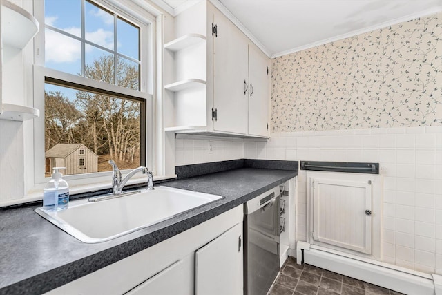 kitchen with dark countertops, white cabinets, dishwasher, and open shelves