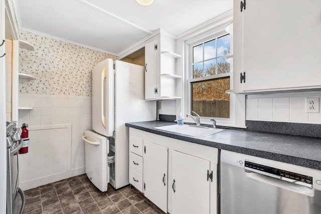 kitchen featuring dishwasher, dark countertops, white cabinetry, open shelves, and a sink