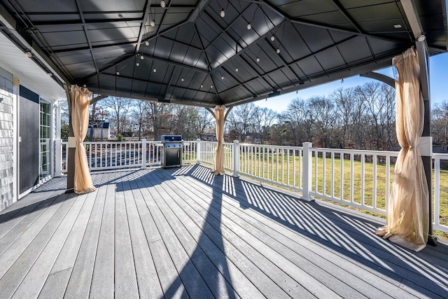 wooden deck with a gazebo