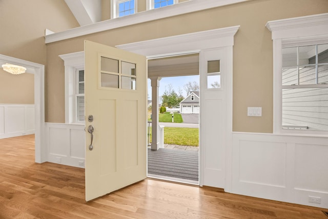 7 Nicklaus Way, Mashpee, MA 02649 - foyer featuring a decorative wall, wainscoting, and light wood finished floors