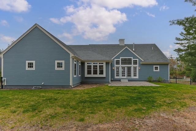 7 Nicklaus Way, Mashpee, MA 02649 - rear view of house with a patio, a chimney, and roof with shingles