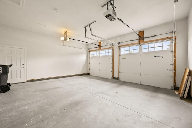 7 Nicklaus Way, Mashpee, MA 02649 - garage featuring a garage door opener