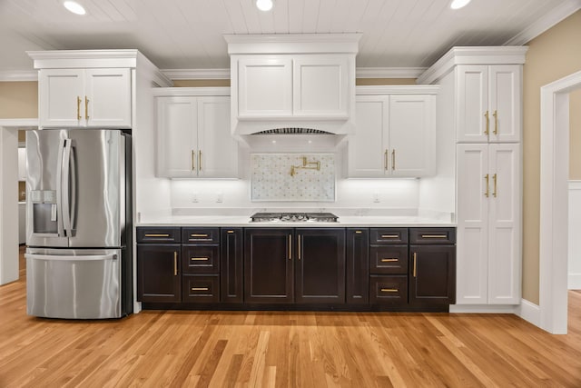 7 Nicklaus Way, Mashpee, MA 02649 - kitchen with stainless steel appliances, white cabinetry, crown molding, recessed lighting, and light wood-type flooring