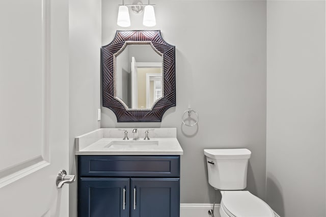 7 Nicklaus Way, Mashpee, MA 02649 - half bathroom with toilet, vanity, and baseboards
