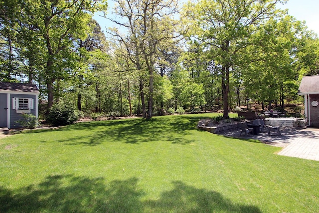 473 Thousand Oaks Dr, Brewster, MA 02631 - view of green lawn featuring a patio