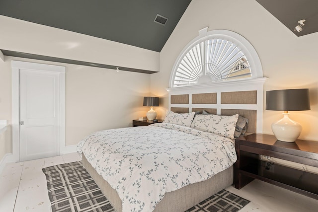 bedroom featuring vaulted ceiling