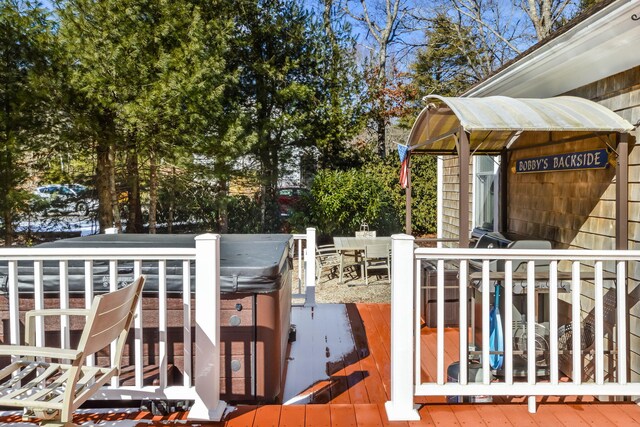 wooden deck with outdoor dining space