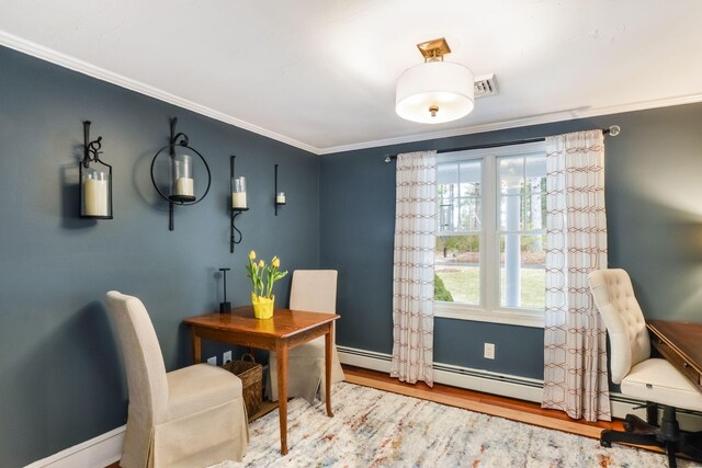 office area with visible vents, wood finished floors, and ornamental molding