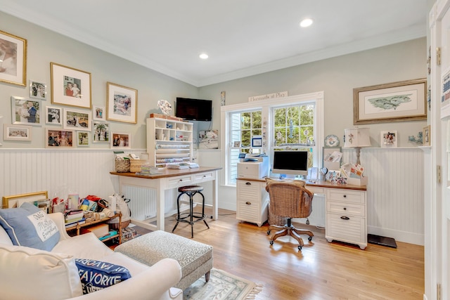 office space featuring crown molding and light hardwood / wood-style floors