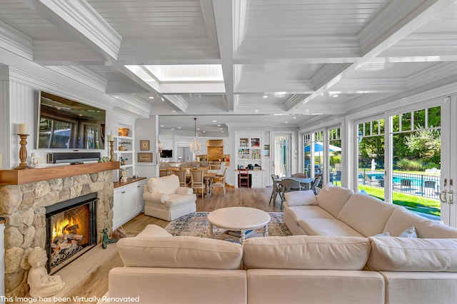 44 Seapuit Rd, Osterville, MA 02655 - living area with light wood finished floors, beamed ceiling, a fireplace, coffered ceiling, and recessed lighting