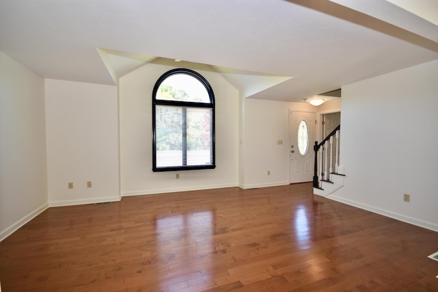 8 Great Rock Rd, Bourne, MA 02532 - foyer entrance with wood finished floors, stairway, lofted ceiling, and baseboards
