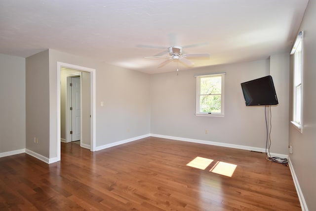 8 Great Rock Rd, Bourne, MA 02532 - unfurnished room featuring a ceiling fan, wood finished floors, and baseboards