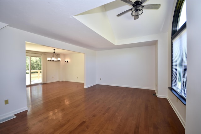 8 Great Rock Rd, Bourne, MA 02532 - empty room with a chandelier, a ceiling fan, dark wood-style floors, and baseboards