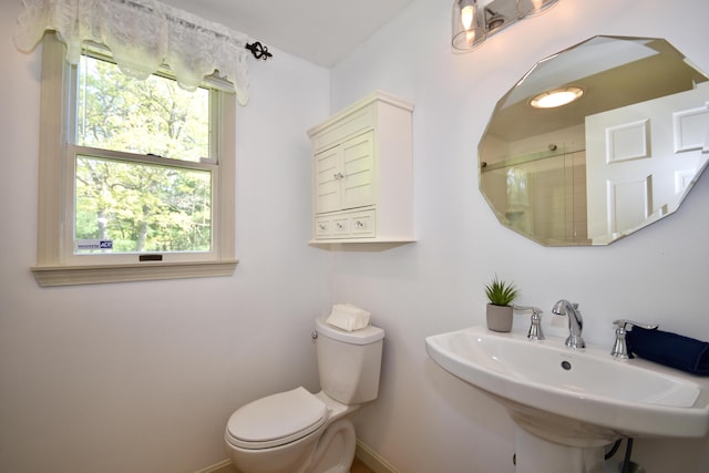 8 Great Rock Rd, Bourne, MA 02532 - full bath featuring toilet, baseboards, a sink, and a shower