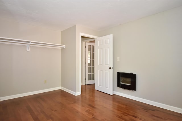 8 Great Rock Rd, Bourne, MA 02532 - unfurnished bedroom with wood finished floors and baseboards