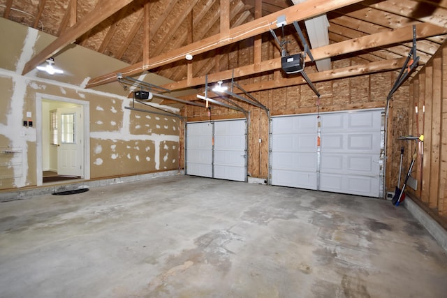 8 Great Rock Rd, Bourne, MA 02532 - garage featuring a garage door opener