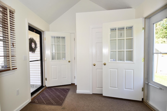 8 Great Rock Rd, Bourne, MA 02532 - foyer with dark colored carpet, lofted ceiling, and baseboards