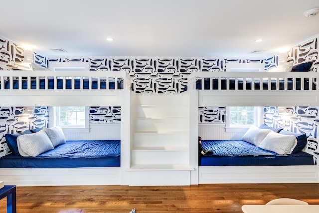 bedroom with wood-type flooring