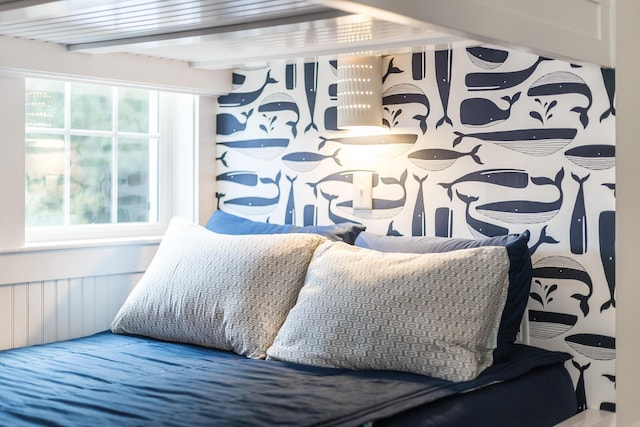 bedroom featuring beam ceiling