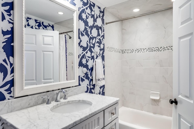 bathroom with vanity, ornamental molding, and shower / bathtub combination with curtain