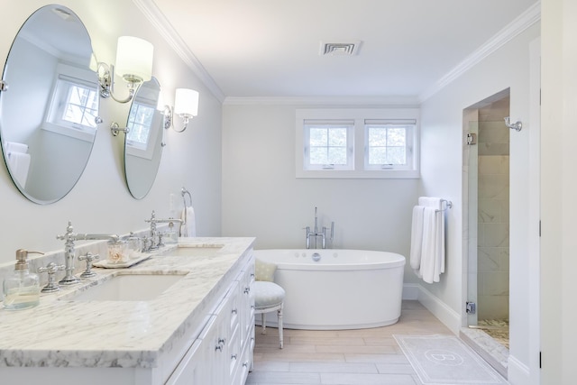 bathroom with vanity, hardwood / wood-style flooring, crown molding, and separate shower and tub