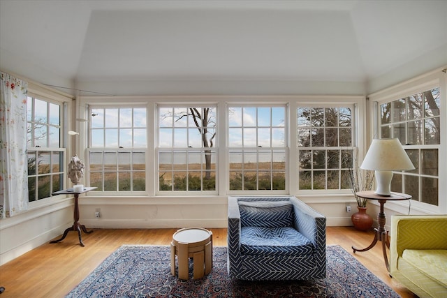 495 Chequessett Neck Rd, Wellfleet, MA 02667 - sunroom with baseboards, wood finished floors, a wealth of natural light, and lofted ceiling