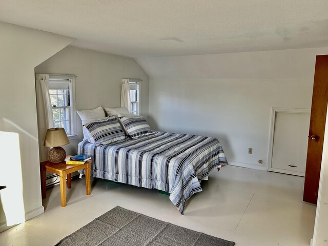 bedroom with vaulted ceiling