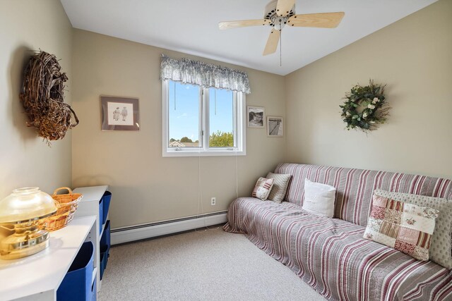 interior space featuring a baseboard radiator, ceiling fan, and carpet