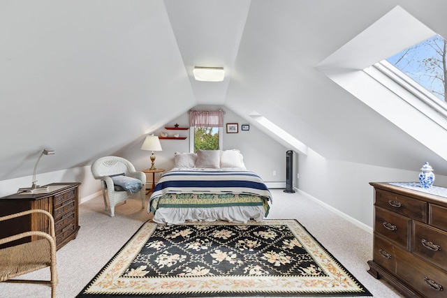 bedroom featuring vaulted ceiling, a baseboard heating unit, light carpet, and baseboards