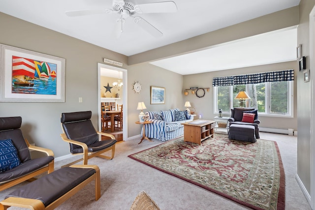 living area with a baseboard radiator, carpet flooring, a ceiling fan, and baseboards