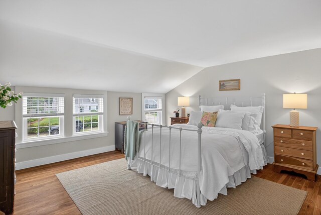 77 Pleasant Rd, West Harwich, MA 02671 - bedroom with wood finished floors and vaulted ceiling