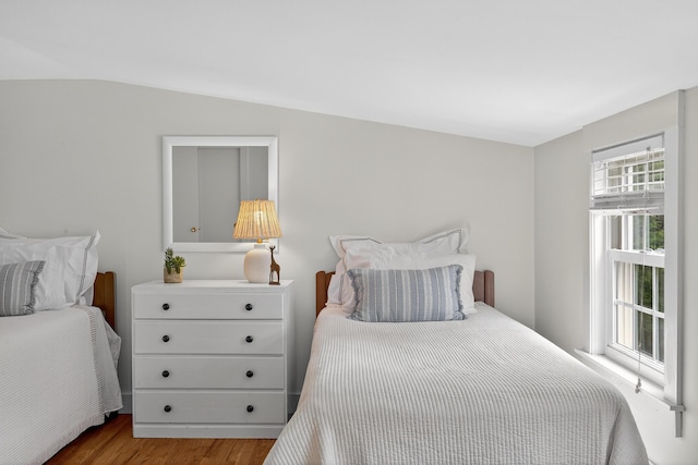 77 Pleasant Rd, West Harwich, MA 02671 - bedroom featuring wood finished floors and lofted ceiling