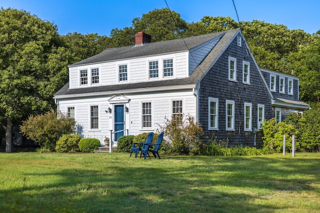 77 Pleasant Rd, West Harwich, MA 02671 - view of front of home featuring a chimney, a front lawn, and roof with shingles