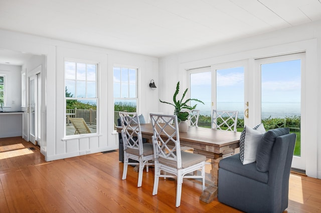 dining area with hardwood / wood-style flooring