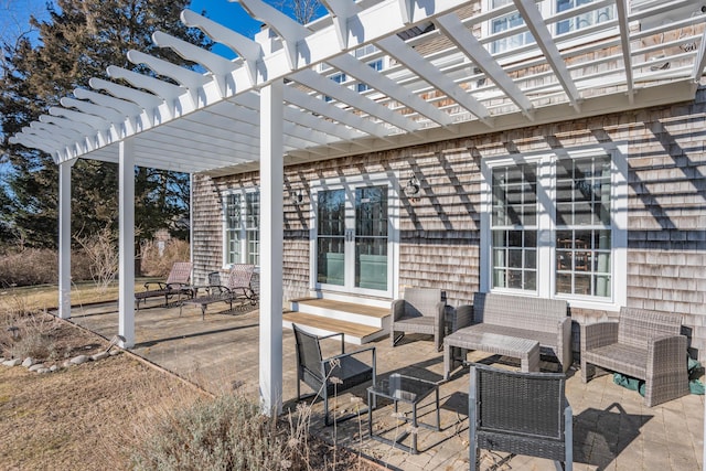 view of patio featuring a pergola and an outdoor hangout area