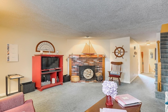 carpeted living room featuring a brick fireplace and a textured ceiling