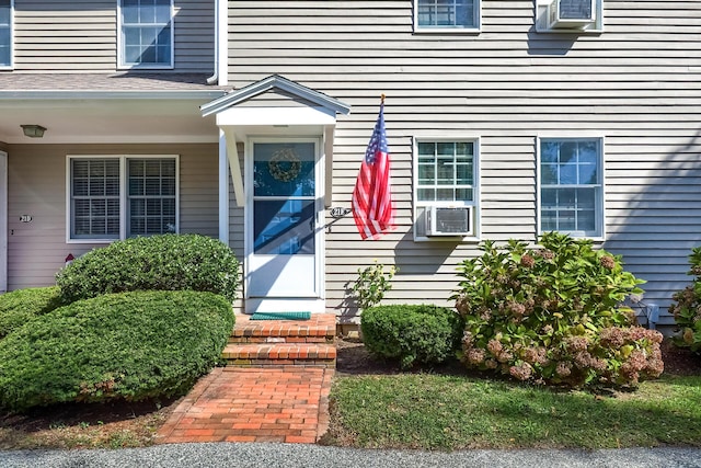 property entrance featuring cooling unit