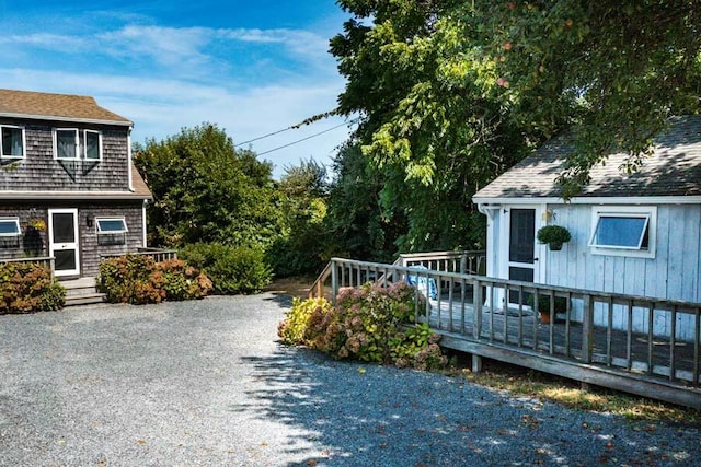 232 Robbins Hill Rd, Brewster, MA 02631 - exterior space with a deck and driveway